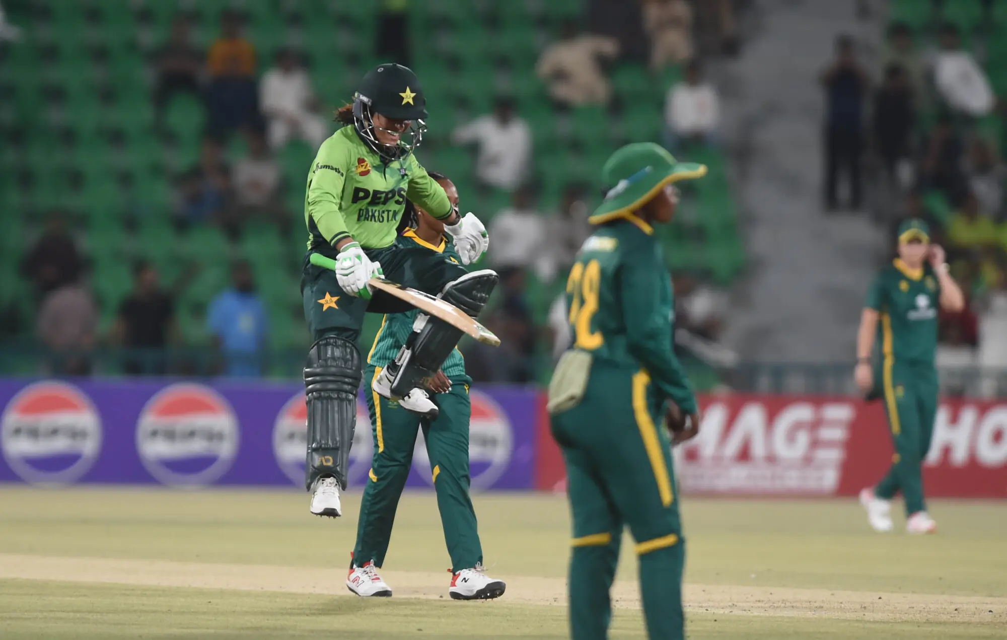 Sidra Amin celebrates after her century against South Africa in the first ODI in Lahore on September 16. &mdash; White Star/Arif Ali