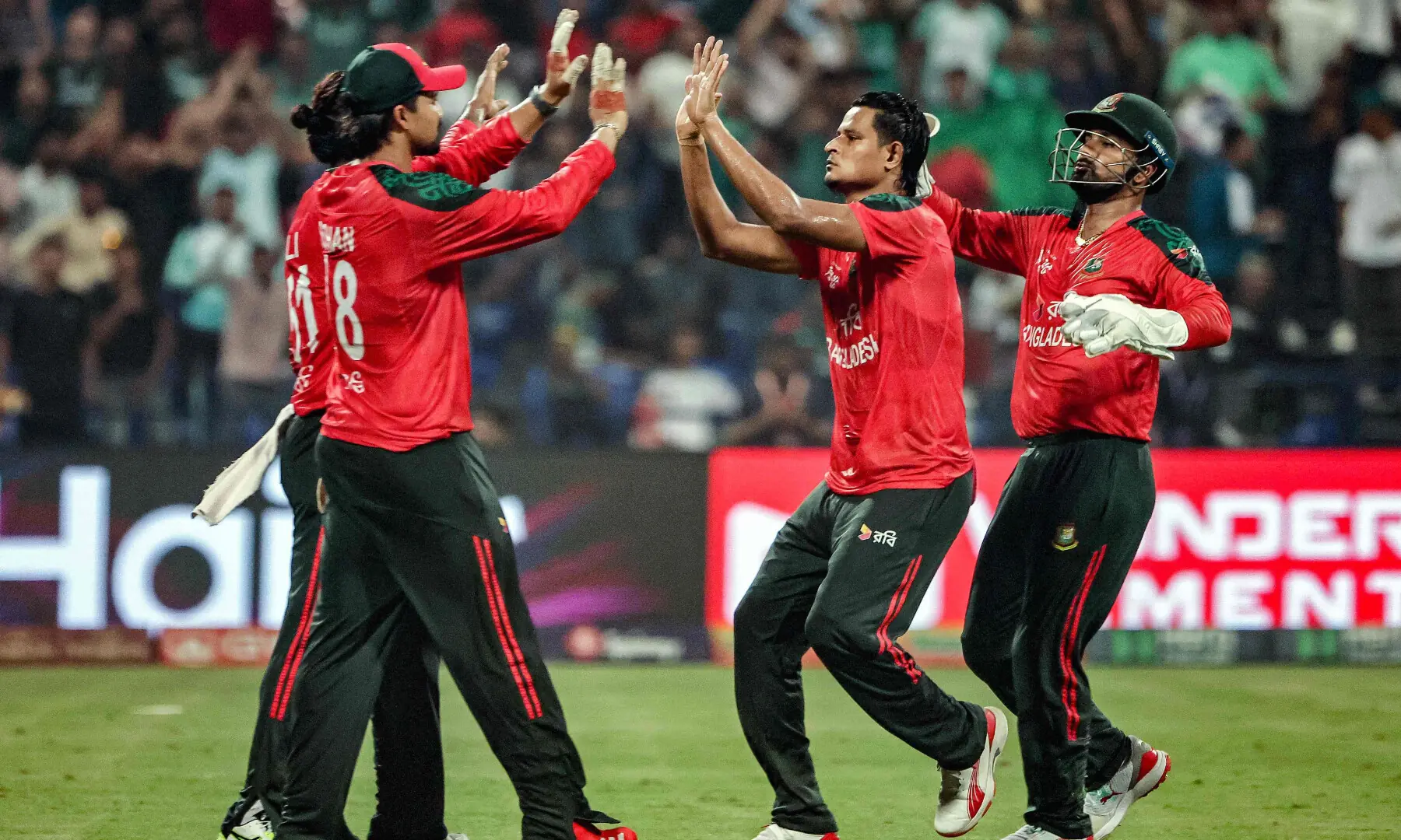 Bangladesh&rsquo;s wicketkeeper and captain Litton Das (R) celebrates with teammates after taking the wicket of Afghanistan&rsquo;s Karim Janat during the Asia Cup 2025 Twenty20 international cricket match between Afghanistan and Bangladesh at the Sheikh Zayed Cricket Stadium in Abu Dhabi on September 16, 2025. &mdash; AFP