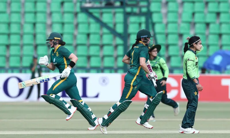 South African batters take a run as Pakistan skipper Fatima Sana looks on in Lahore on September 19. &mdash; X/PCB