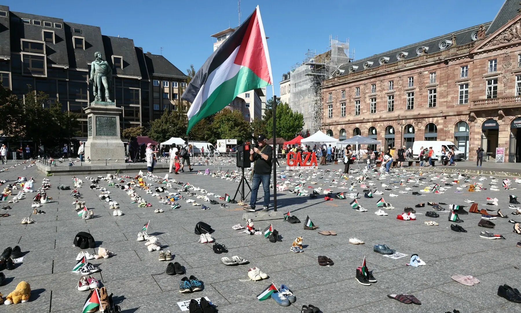  This photograph shows shoes laid out on Place Kleber symbolising Palestinians killed during Israel&rsquo;s offensive on the Gaza strip, in Strasbourg, eastern France on Sept 20, 2025, as part of a symbolic action named &ldquo;Operation Shoes &ndash; Lives, not just numbers!&rdquo; by the Collectif Palestine 67. &mdash; AFP 