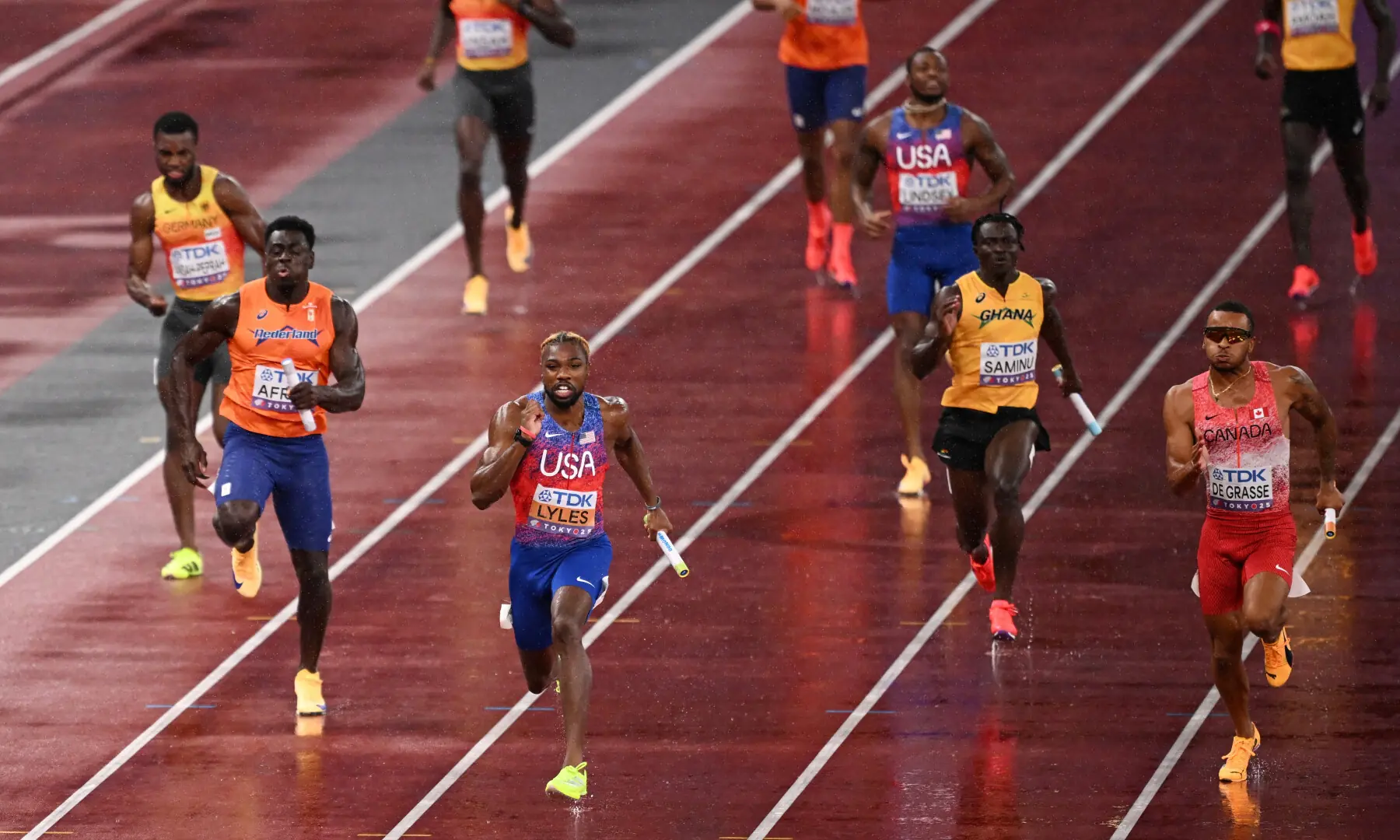 NOAH Lyles (C) of the US sprints during the World Athletics Championships 4x100m relay final at the Japan National Stadium on Sunday.&mdash;Reuters