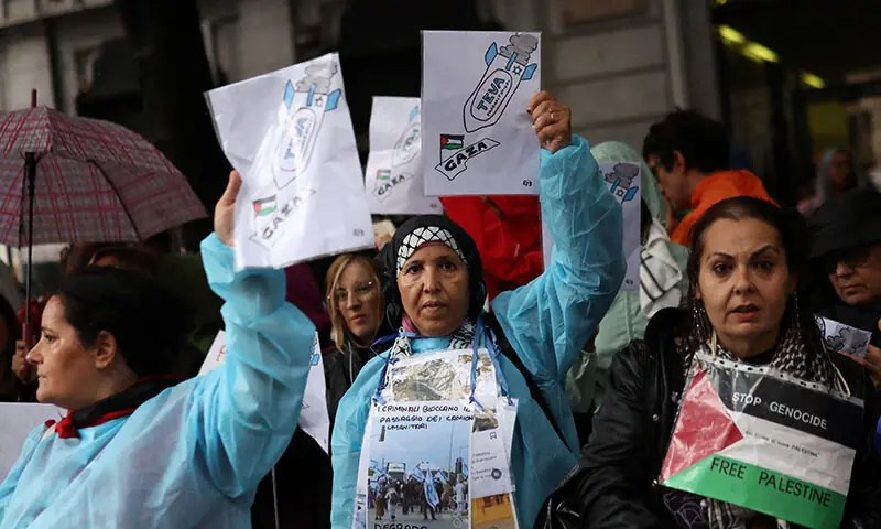 People attend a general strike organised by grassroots unions to express solidarity with Palestinians and call for political action in Milan, Italy on September 22. &mdash; Reuters