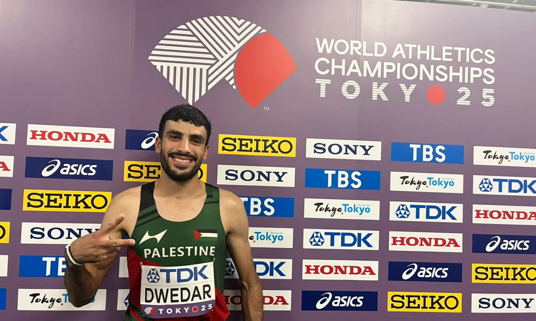 Muhammad Dwedar smiles and poses for a photo after the men’s 800m race at the World Athletics Championships at the Japan National Stadium in Tokyo on September 17, 2025. — Photo by Anushe Engineer