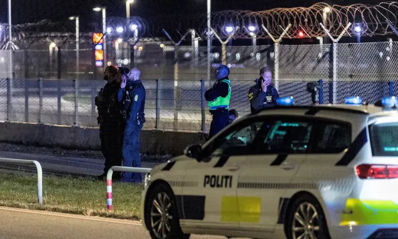 Police officers stand guard after all traffic has been closed at the Copenhagen Airport due to drone reports in Copenhagen, Denmark on September 22, 2025. &mdash; Reuters