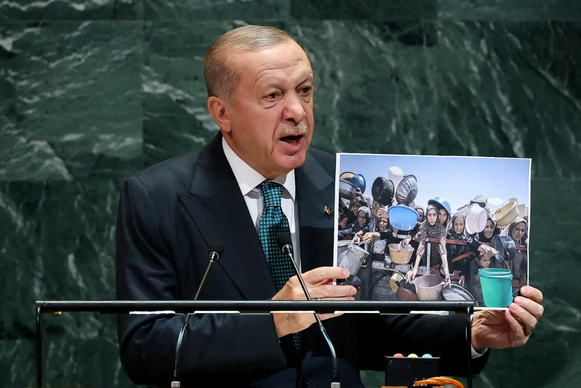  Turkiye&rsquo;s President Tayyip Erdogan shows a picture as he addresses the 80th United Nations General Assembly at UN headquarters in New York, US, Sept 23. &mdash; Reuters 