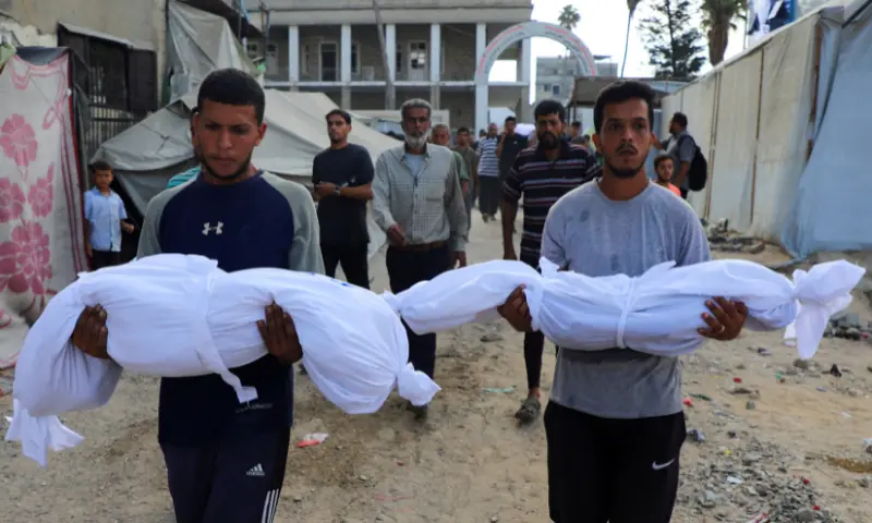 Mourners carry the bodies of Palestinian children, who, according to medics, were killed in a deadly overnight Israeli strike on a building where displaced people were taking shelter, amid an Israeli military operation, at Al-Ahli Arab Hospital in Gaza City, on September 24. &mdash; Reuters