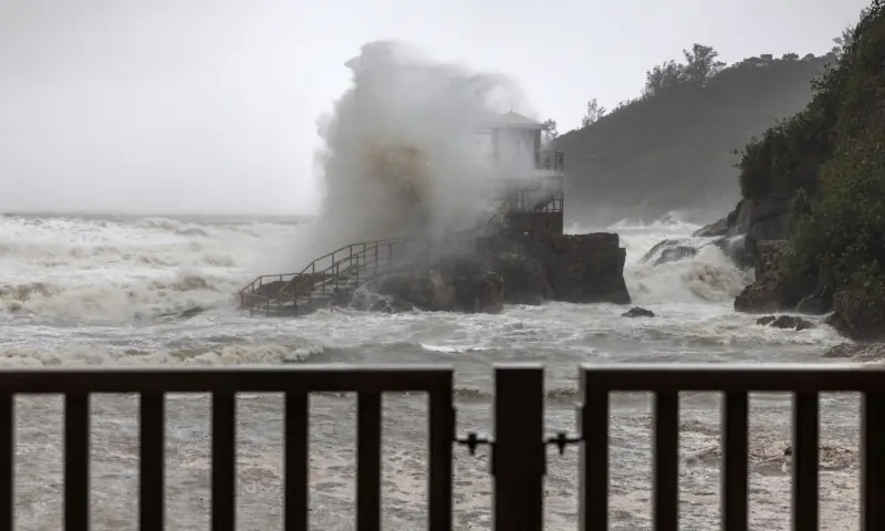 A wave breaks against a lifeguard tower at a beach as Super Typhoon Ragasa moved past Hong Kong on September 24 —AFP A wave breaks against a lifeguard tower at a beach as Super Typhoon Ragasa moved past Hong Kong on September 24 —AFP