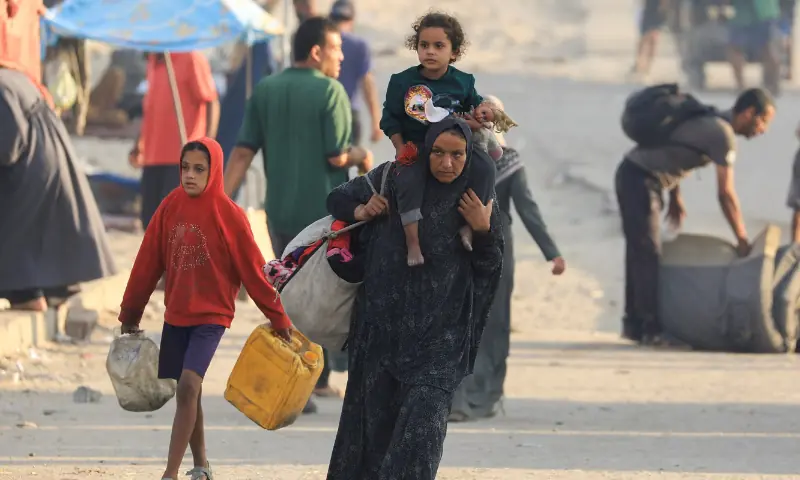 Displaced Palestinians, fleeing northern Gaza due to Israeli bombardment, move southward after Israeli forces ordered residents of Gaza City to evacuate to the south, in the central Gaza Strip, on September 24. &mdash; Reuters
