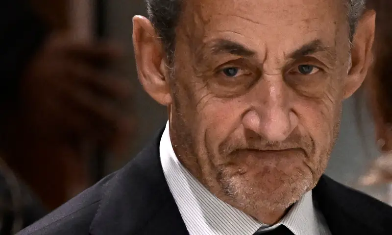 Former French president Nicolas Sarkozy leaves after the verdict in his trial for illegal campaign financing from Libya for his successful 2007 presidential bid, at the Tribunal de Paris courthouse in Paris on September 25, 2025. &mdash; AFP