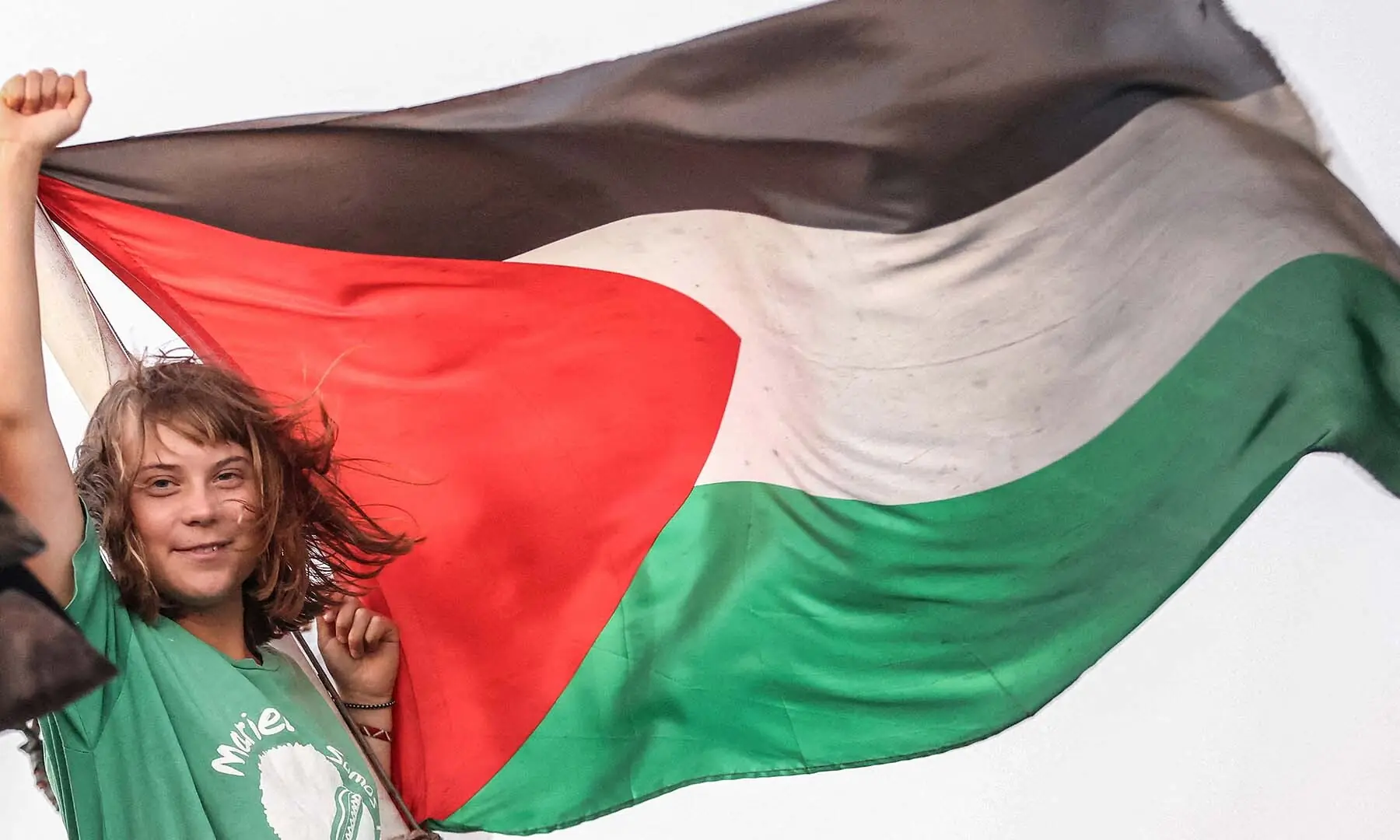 Greta Thunberg gestures next to a Palestinian flag on a ship, part of the Global Sumud Flotilla, off Crete island, Greece on September 25. — Reuters