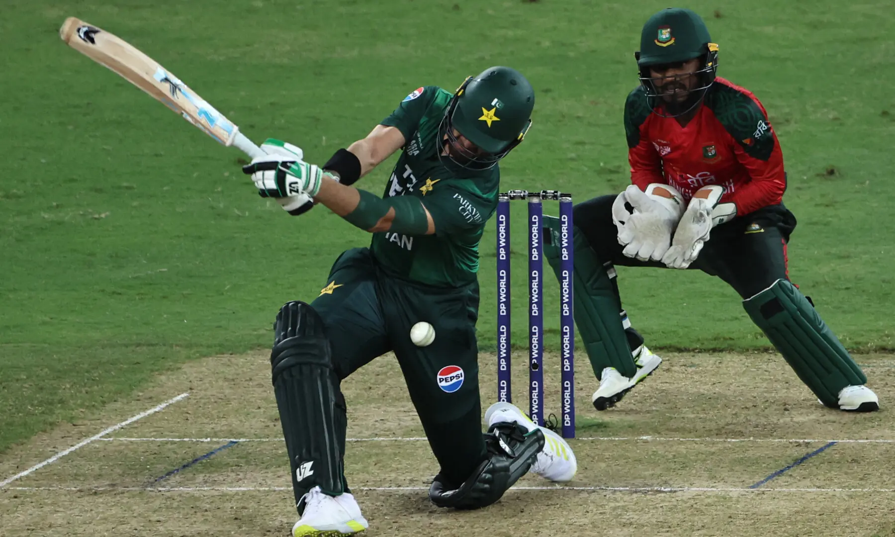 Shaheen Shah Afridi (L) plays a shot as Bangladesh’s wicketkeeper captain Jaker Ali watches during the Asia Cup 2025 Super Four Twenty20 international cricket match between Bangladesh and Pakistan at the Dubai International Stadium, in Dubai on September 25, 2025. — AFP
