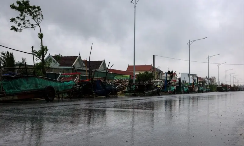 Boats are kept on a road as Typhoon Bualoi nears, in Nghe An province, Vietnam, September 28, 2025. &mdash; Reuters/Thinh Nguyen