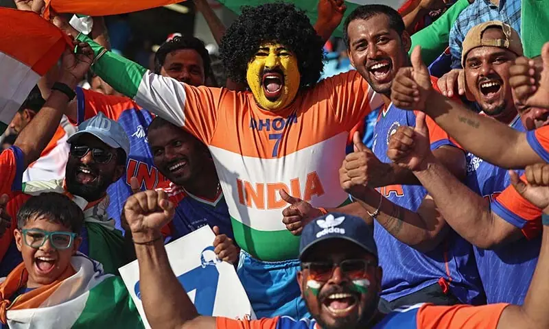 Indian fans cheer before the start of the Asia Cup 2025 final between India and Pakistan at the Dubai International Stadium in Dubai, the UAE on September 28. &mdash; AFP