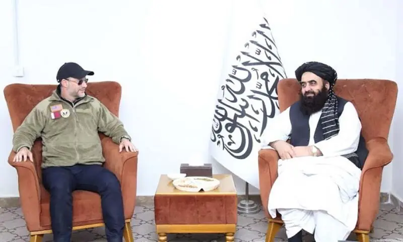 A photo of released American prisoner Ami Amiri and Afghan Foreign Minister Amir Khan Muttaqi. — Photo via Afghan foreign ministry A photo of released American prisoner Ami Amiri and Afghan Foreign Minister Amir Khan Muttaqi. — Photo via Afghan foreign ministry