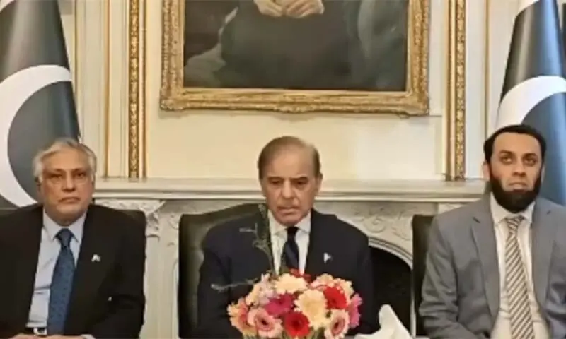 Prime Minister Shehbaz Sharif (centre) flanked by Deputy Prime Minister and Foreign Minister Ishaq Dar (left) and Information Minister Attaullah Tarar (right), addressing a press conference in London on September 29. &mdash; Screenshot via X/@GovtofPakistan