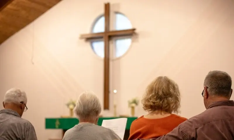 Community members gather for a prayer service at Gloria Dei Lutheran Church on September 29, 2025 in Grand Blanc, Michigan.&mdash; AFP