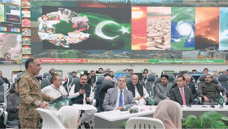 NDMA Chairman Lt Gen Inam Haider Malik briefs parliamentarians on current flood situation.&mdash;White Star