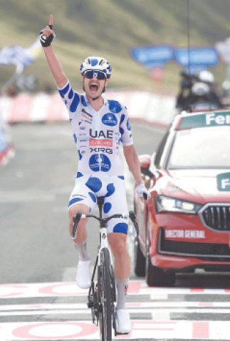 TEAM UAE-XRG’S Australian rider Jay Vine celebrates after winning the 10th stage of the Vuelta a Espana on Tuesday.—AFP