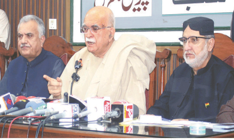 QUETTA: Accompanied by Sardar Akhtar Mengal, PkMAP leader Mehmood Khan Achakzai addresses a press conference.—PPI QUETTA: Accompanied by Sardar Akhtar Mengal, PkMAP leader Mehmood Khan Achakzai addresses a press conference.—PPI