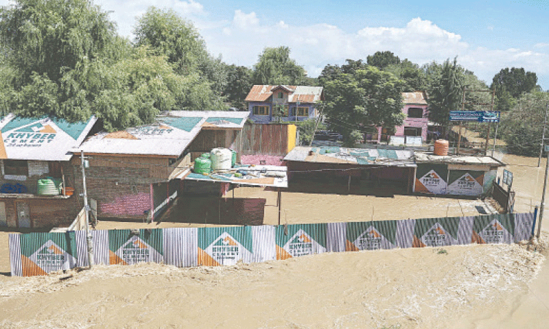 Srinagar: A view of submerged houses in a flood-affected area following heavy rains in Pampore in India-held Kashmir.&mdash;AFP