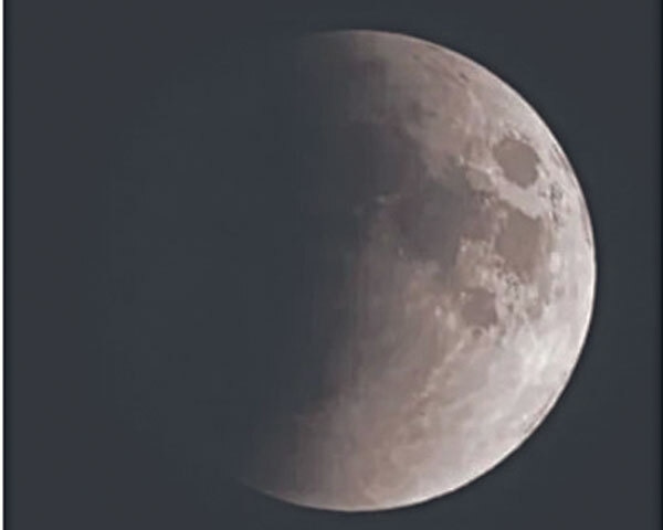A partial lunar eclipse is when an imperfect alignment of the Sun, the Earth and the Moon results in the Moon passing through only part of Earth's umbra. The shadow grows and then recedes without ever entirely covering the Moon | Nasa