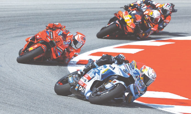 BK8 Gresini Racing MotoGP&rsquo;s Alex Marquez of Spain rides ahead of brother Marc Marquez of Ducati Lenovo Team during the Moto GP Catalan Grand Prix at Circuit de Barcelona on Sunday.
&mdash;Reuters