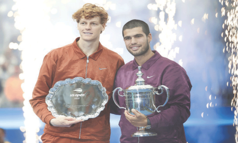 SPAIN’S Carlos Alcaraz (R) and Jannik Sinner of Italy pose with their US Open winner and runners-up trophies, respectively, after the final at the Billie Jean King National Tennis Center.—Reuters SPAIN’S Carlos Alcaraz (R) and Jannik Sinner of Italy pose with their US Open winner and runners-up trophies, respectively, after the final at the Billie Jean King National Tennis Center.—Reuters