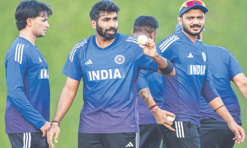 DUBAI: (L-R) Indian cricketers Abhishek Sharma, Jasprit Bumrah and Axar Patel attend a practice session at the ICC Academy ground on Monday. &mdash; AFP
