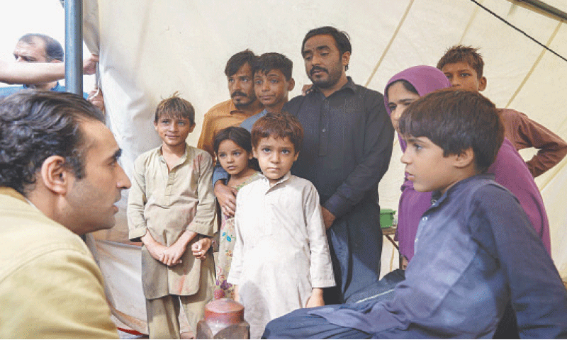 MULTAN: PPP Chairman Bilawal Bhutto-Zardari interacts with flood-hit children.&mdash;PPI