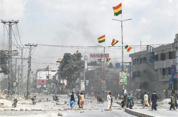 Protesters burn tyres as they block a road in Quetta during a strike called by an opposition alliance to protest last week’s suicide bombing, which targeted a BNP-M rally.—AFP Protesters burn tyres as they block a road in Quetta during a strike called by an opposition alliance to protest last week’s suicide bombing, which targeted a BNP-M rally.—AFP