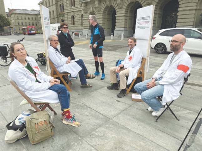 Bern: Swiss doctors sit outside the parliament building at the start of their hunger strike over Gaza, calling on their government to apply targeted sanctions on Israel over its violations of international law and to recognise a Palestinian state.&mdash;Reuters