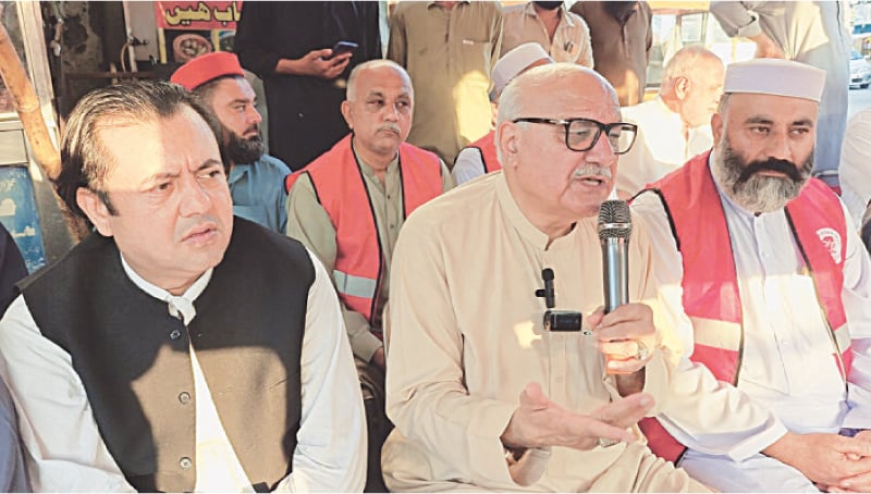 ANP provincial president Mian Iftikhar Hussain speaks to media-persons at a relief camp set up in Charsadda for earthquake victims of Afghanistan. — Dawn ANP provincial president Mian Iftikhar Hussain speaks to media-persons at a relief camp set up in Charsadda for earthquake victims of Afghanistan. — Dawn