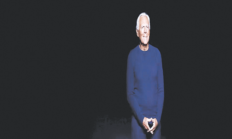 Italian fashion designer Giorgio Armani acknowledges the applause after presenting the Emporio Armani men&rsquo;s fall-winter 2016-2017 collection, part of Milan Fashion Week, in Jan 2016 | AP Photo/Luca Bruno