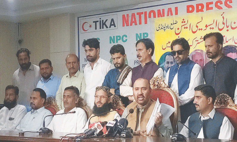 President Anjuman-i-Tajran Pakistan Kashif Chaudhry addresses a press conference at the National Press Club on Thursday along with representatives of Nanbai Association of Rawalpindi. — Photo by Mohammad Asim President Anjuman-i-Tajran Pakistan Kashif Chaudhry addresses a press conference at the National Press Club on Thursday along with representatives of Nanbai Association of Rawalpindi. — Photo by Mohammad Asim