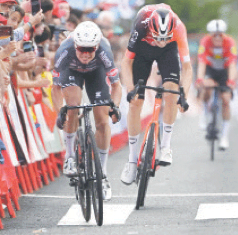 TEAM Alpecin&rsquo;s Jasper Philipsen (L) of Belgium competes before crossing the finish line to win the 19th stage of the Vuelta a Espana, a 159km distance from Rueda to Guijuelo, on Friday.&mdash;AFP