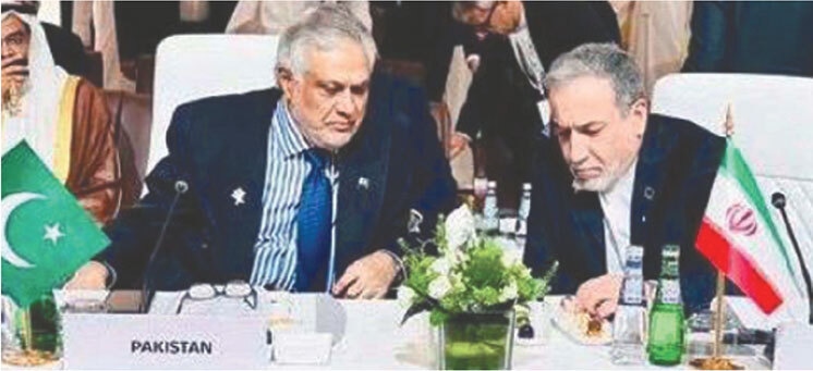 Foreign Minister Ishaq Dar interacts with his Iranian counterpart Abbas Araghchi on the sidelines of the foreign ministers&rsquo; meeting in Doha.&mdash;APP