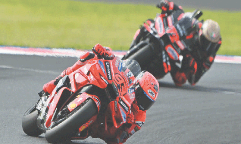 Ducati Lenovo Team’s Spanish rider Marc Marquez (L) leads Aprilia Racing team’s Italian rider Marco Bezzecchi in action during the MotoGP San Marino Grand Prix at the Misano World Circuit on Sunday.—AFP Ducati Lenovo Team’s Spanish rider Marc Marquez (L) leads Aprilia Racing team’s Italian rider Marco Bezzecchi in action during the MotoGP San Marino Grand Prix at the Misano World Circuit on Sunday.—AFP