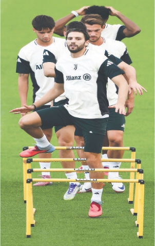  TURIN: Manuel Locatelli (front) of Juventus takes part in physical drills along with team-mates at the club&rsquo;s training centre on Monday.&mdash;AFP 