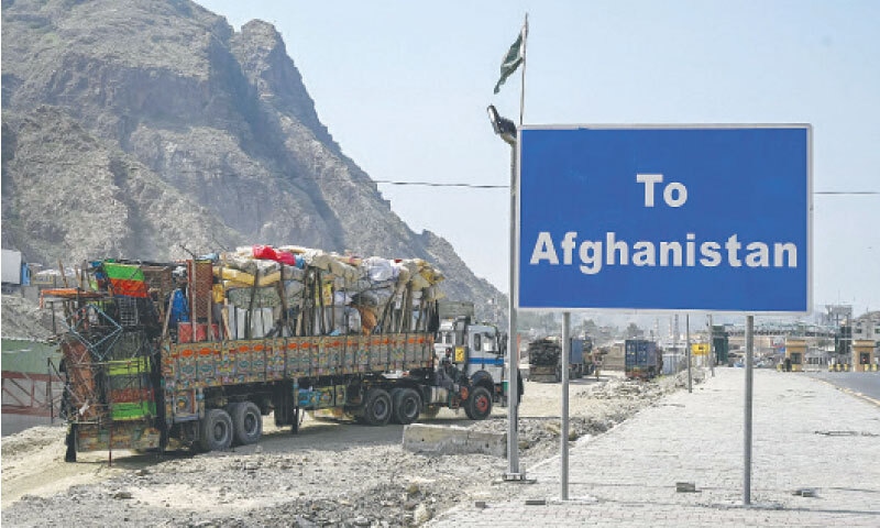 TORKHAM: Trucks laden with Afghan refugees&rsquo;  belongings arrive at the main border crossing between Pakistan and Afghanistan. According to IOM, over 112,000 Afghans returned to their country in the last week of August.&mdash;AFP