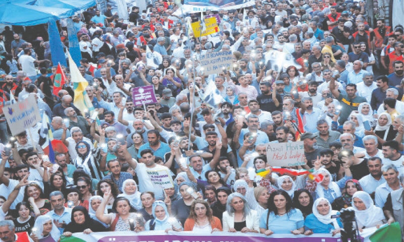 SUPPORTERS of Abdullah Ocalan, the jailed Kurdish leader, march during a demonstration in Diyarbakir demanding his release.—Reuters SUPPORTERS of Abdullah Ocalan, the jailed Kurdish leader, march during a demonstration in Diyarbakir demanding his release.—Reuters