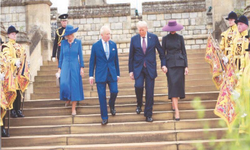 US President Donald Trump and First Lady Melania Trump participate in a Windsor Castle East Lawn Ceremony with King Charles and Her Majesty Queen Camilla of the United Kingdom.&mdash;Reuters