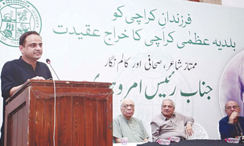 Mayor Murtaza Wahab speaks at the event as Munawar Saeed, Shakeel Adilzada and Dr Aqeel Abbas Jafari look on.&mdash;Dawn