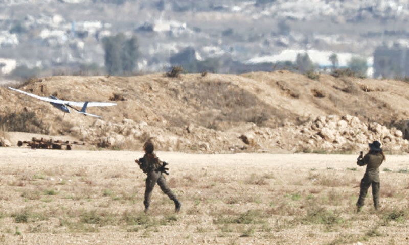 Israeli soldiers launch a drone, as tanks advanced into the densely populated Gaza City.&mdash;Reuters