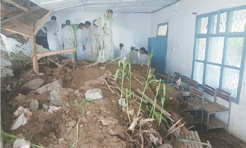 A view of the damaged classroom of a school in Puran, Shangla. &mdash; Dawn