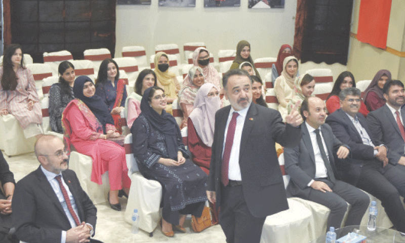 Turkish Ambassador Irfan Neziroglu addresses students awarded Turkiye Scholarships in 2025 at a function in Islamabad on Thursday. &mdash; Photo by Tanveer Shahzad