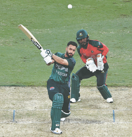 PAKISTAN batter Mohammad Nawaz hits out as Bangladesh captain Jaker Ali watches during the Asia Cup Super Four match at the Dubai International Stadium on Thursday.&mdash;AFP