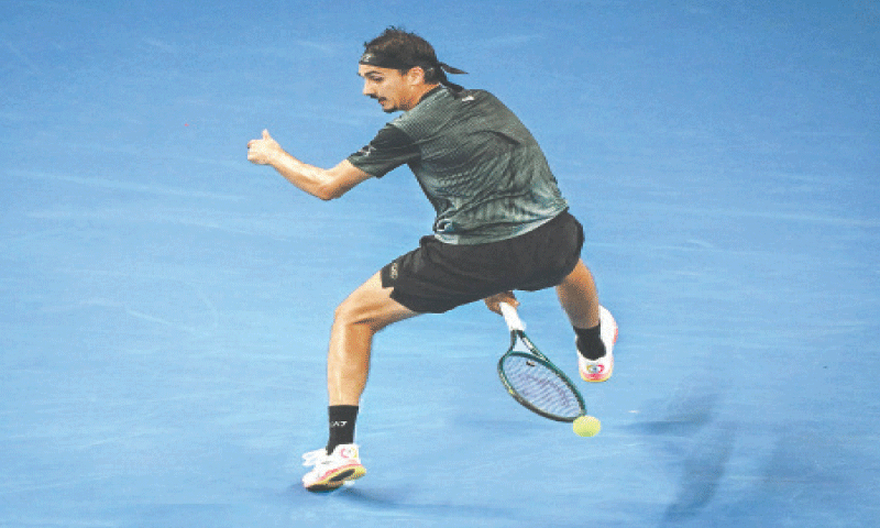 BEIJING: Italy&rsquo;s Lorenzo Sonego hits a return to Alexander Zverev of Germany during their China Open match on Friday.&mdash;AFP