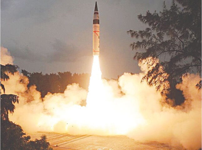  An Agni-V intercontinental ballistic missile being launched by India in 2013: the India-Pakistan contest has become a live lab for the most dangerous aspects of nuclear deterrence theory | AFP 
