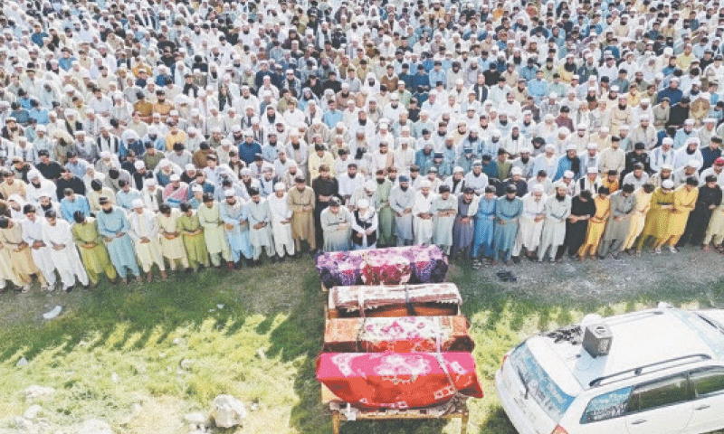 Funeral prayers of four youngsters being offered in Lowi Mamund tehsil of Bajaur on Sunday. &mdash; Dawn