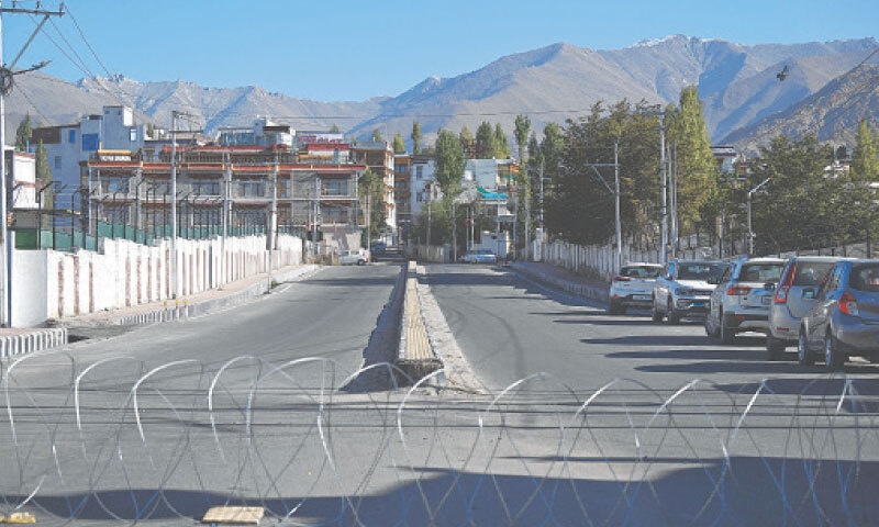 A deserted road during a curfew in Leh on Sunday. &mdash; AFP